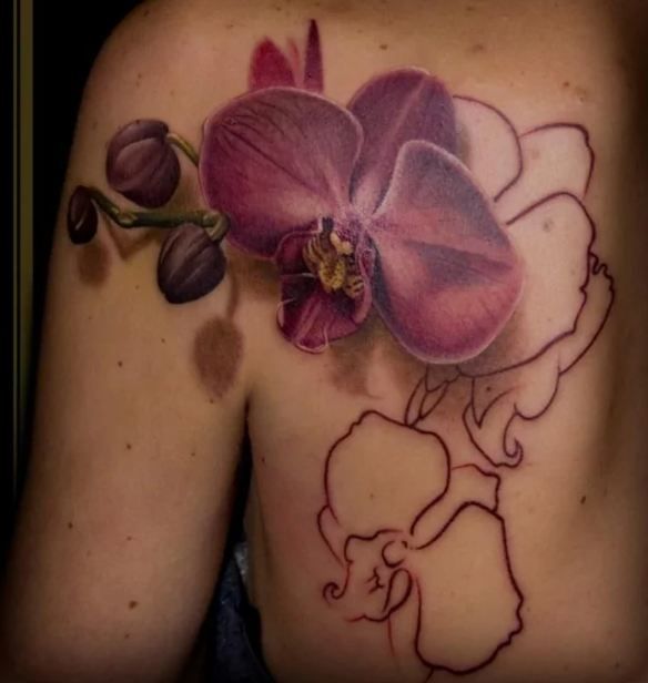 10 hermosos tatuajes de orquídeas que querrás hacerte ASAP